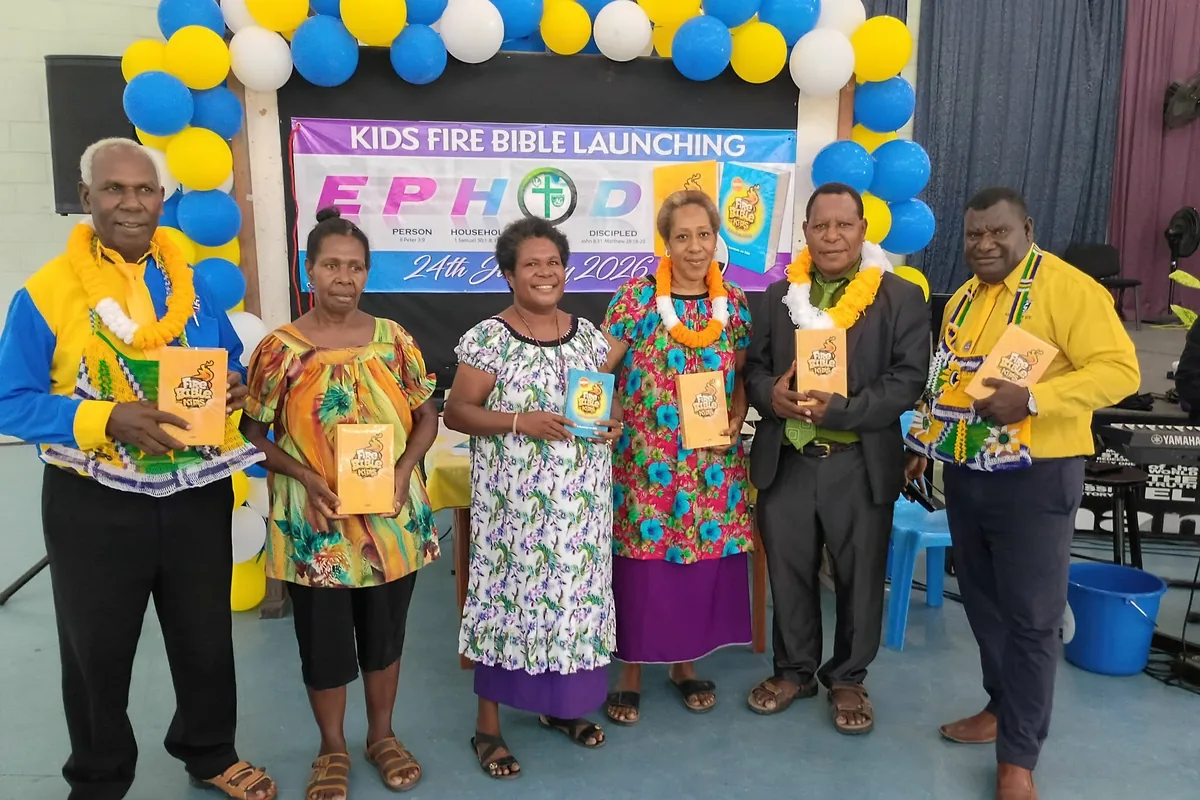 The EPHOD of Papua New Guinea team holding Kids Fire Bibles at the launching, January 2026